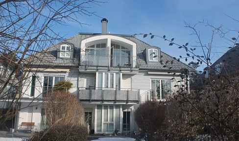 Two-story apartment with a south-facing balcony in Waldtrudering.