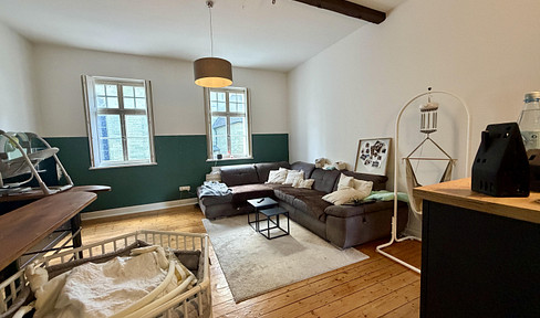 Duplex apartment with the charm of an old building and a private terrace.