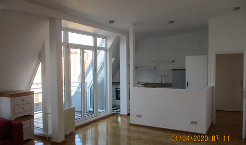 Beautiful 4-room attic apartment in a renovated building, located in the popular Friedrichshain district.