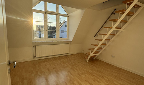 3-room attic apartment with balcony + fitted kitchen in Maisach, usable area 151 sq m, 5 minutes walk to the S3 train line.