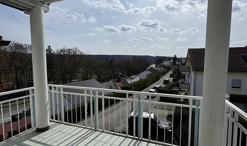 2-room apartment with south-facing balcony, fitted kitchen, underground parking space, and parking space – offering great potential in Fürstenfeldbruck, commission-free.