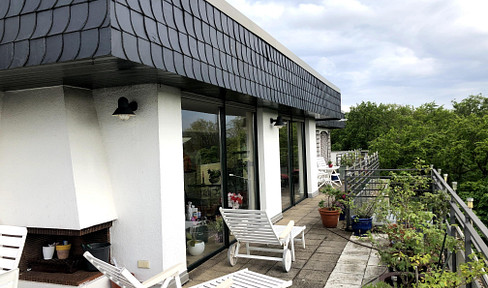 Exclusive 160 m² penthouse apartment with a 110 m² rooftop terrace and fireplace, located in Krefeld-Bockum.