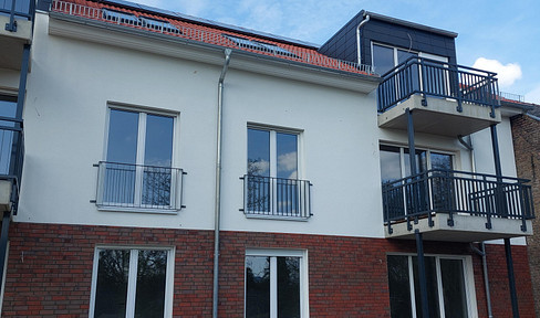 First-time occupancy: 2-room apartment (1st floor, balcony, accessible) in Berge near Nauen.