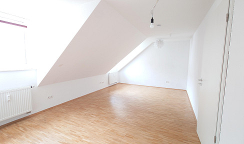 Zentral aber ruhig: Gemütliche Dachgeschosswohnung in der City