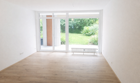 Modern 3-room apartment (approx. 97 m²) with terrace and garden.