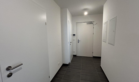 Erstbezug: 1. Dachgeschoß-Top-Wohnqualität in U1 Nähe