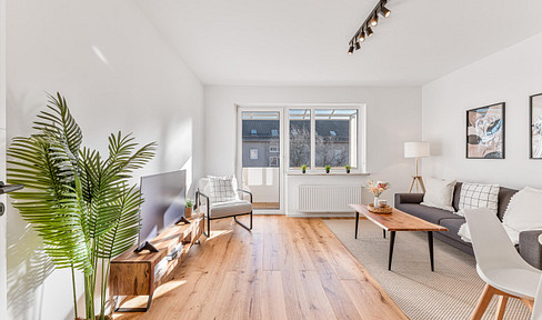 High-quality renovated 2-room apartment in Augsburg-Lechhausen, featuring a balcony, attic storage space, and a cellar.
