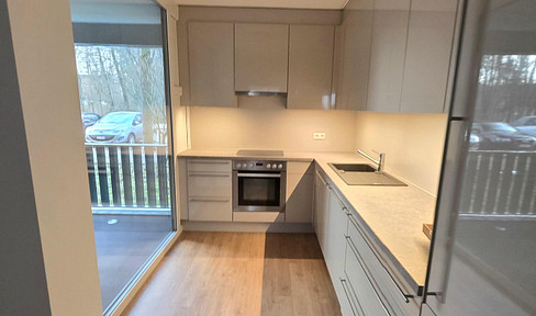 Exclusive 2-room apartment, 70m², with a balcony on the ground floor and a view of the greenery.