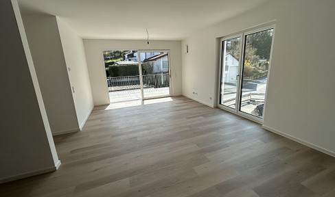 Erstbezug: Premium Neubauwohnung A+ mit Aufzug, EBK, Balkon & Abendsonne in Zell