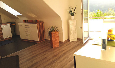 Bright, modern 4-room attic apartment with a balcony, centrally located in Bad Kissingen.