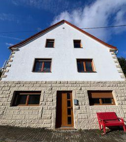 Apartment in the attic with a balcony and a newly renovated bathroom.