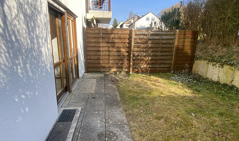 Charming, recently renovated garden apartment with garage and fitted kitchen.