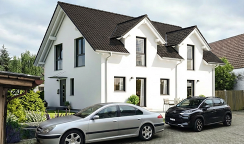 *New Construction* Semi-detached house with a stunning garden, located in the heart of Grenzach-Wyhlen.