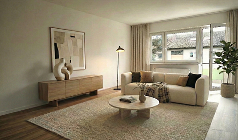 High-quality renovated and immediately available: 3-room apartment with a large balcony, fitted kitchen, and garage.