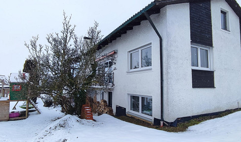 A single-family or two-family house with a large property.