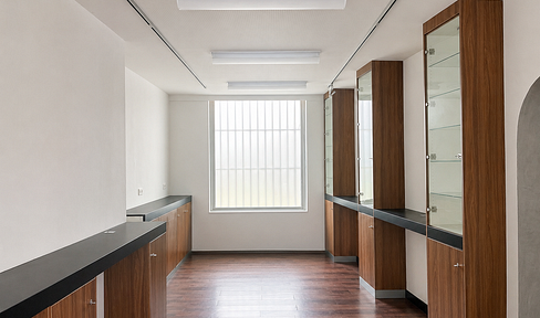 Office/Therapy Room/Massage Studio – approximately 87 square meters, ground floor with storefront window and parking space.