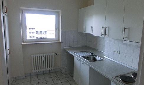 Tastefully renovated, bright 2.5-room apartment with fitted kitchen and balcony, available for rent immediately.