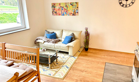 Stylishly furnished: Beautiful, modern 2-room ground floor apartment with a kitchen and parking space, insulated - bright and quiet.