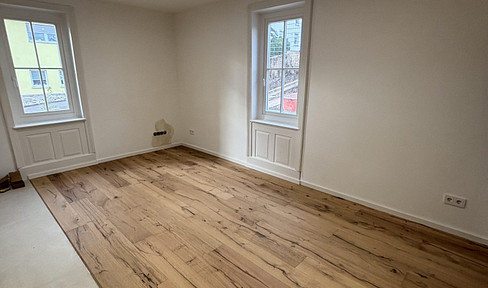 First occupancy after complete renovation: Modern 2-room apartment with the charm of a traditional building.