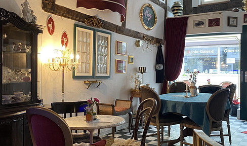 Your dream of owning your own café! A residential building with an existing café, an additional building, and a large courtyard.