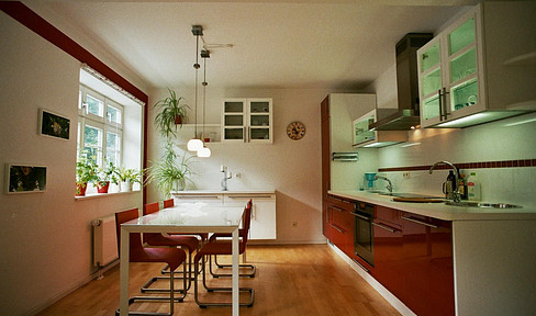 Renovated pre-1928 building, a listed building, featuring: living room, living/kitchen area, bedroom, bathroom, and guest toilet.