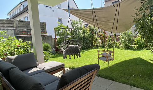 Modern 3.5-room ground-floor apartment with a garden.