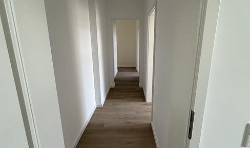 Modernized 5-room apartment with 2 bathrooms and a guest toilet.