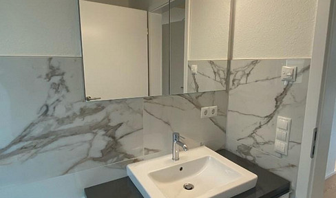 New construction: 3-room apartment on the ground floor, accessible, with fitted kitchen, terrace, and garden.