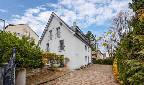 Completely renovated multi-family building with commercial space.