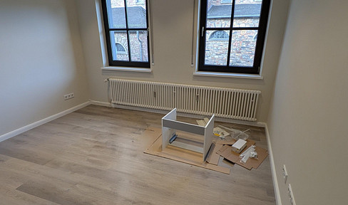 Brand new! Stylish studio apartment in a prime location in Rüdesheim, with a kitchen.