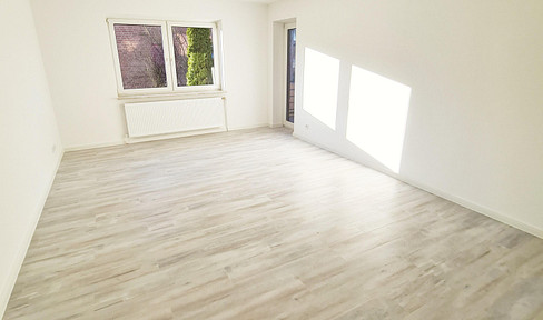 Modernized 3-room apartment with garden and parking space in Stade-Haddorf.