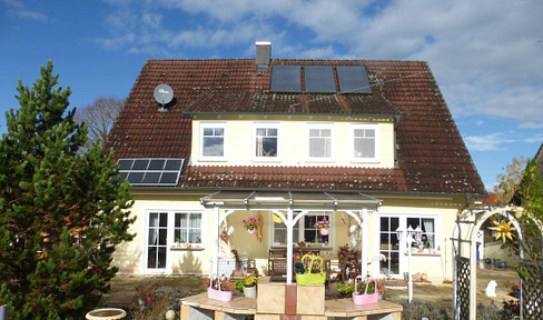 Attractive detached family home in a country house style is seeking new owners.