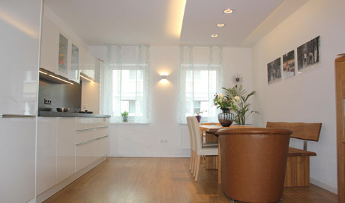 Charming 4-room apartment with a fireplace, balcony, and shared access to a garden.