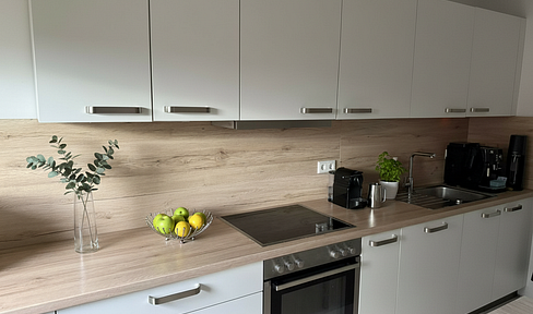 Zentrale Wohnung mit Garten und Einbauküche