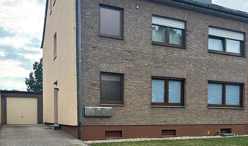 FOR SALE: Multi-family house with 3 rental units, a garden, and a garage.