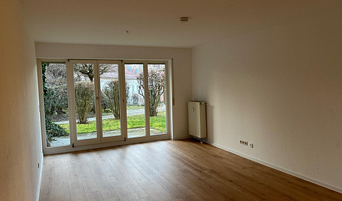 Attractive 2-room ground floor apartment with terrace and garage.