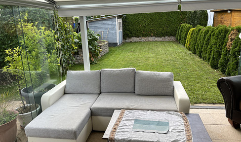 Modern terraced house with a private garage and parking space, located in a quiet residential area of Ditzingen.