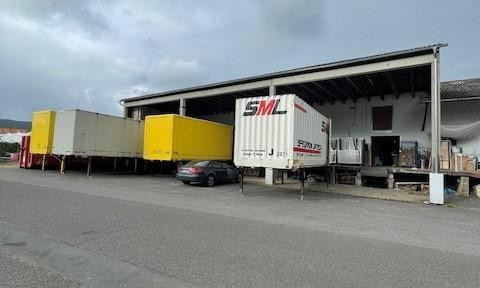 Storage space within a larger warehouse.