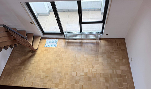 Well-maintained 2.5-room maisonette apartment with fitted kitchen and balcony in Bad Homburg.