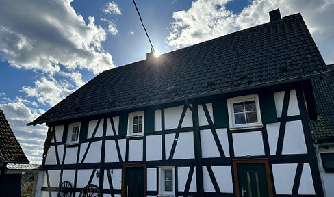 Farmhouse / Half-timbered house.