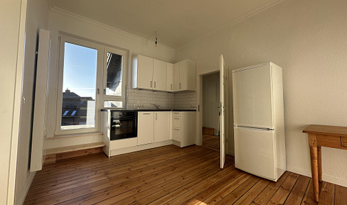 Completely renovated attic apartment with a balcony, located in the city center.