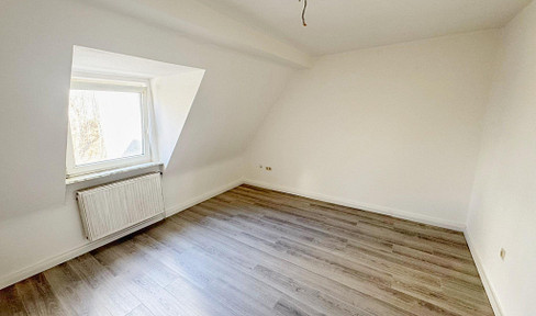 Renovated apartment with a garden and parking space, located in a quiet area.