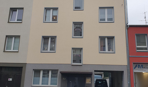 6-unit apartment building with a commercial hall in Krefeld.