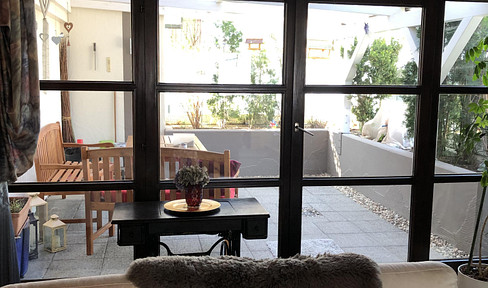 Welcome to our spacious maisonette apartment, featuring 4-5 rooms and a double garage.