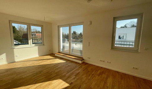 Bright penthouse apartment with an open-plan living area leading to the terrace - brand new construction, never occupied before.