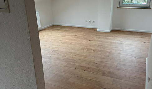 Attractive one-bedroom attic apartment in a picturesque location.