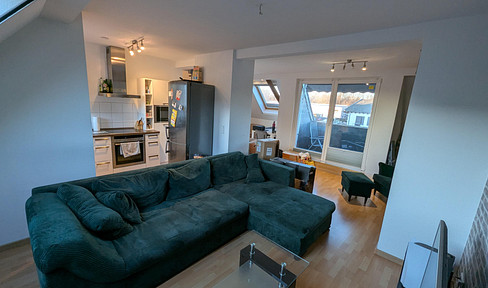 Modern apartment on the top floor, with additional rooms in the attic and a private storage room in the basement.