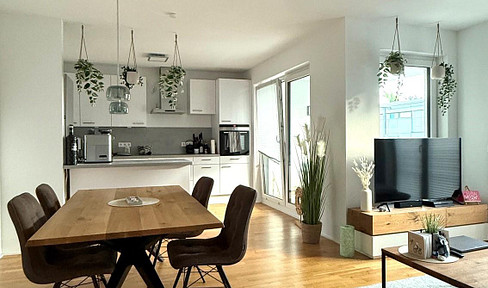 Exclusive 4-room apartment with 2 balconies and a parking space in a garage, located in a quiet area.