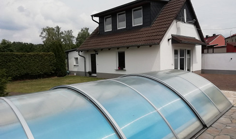 Einfamilienhaus plus Ferienhäuschen
