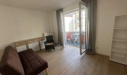 Fully furnished, bright, and beautiful one-bedroom apartment with a balcony.